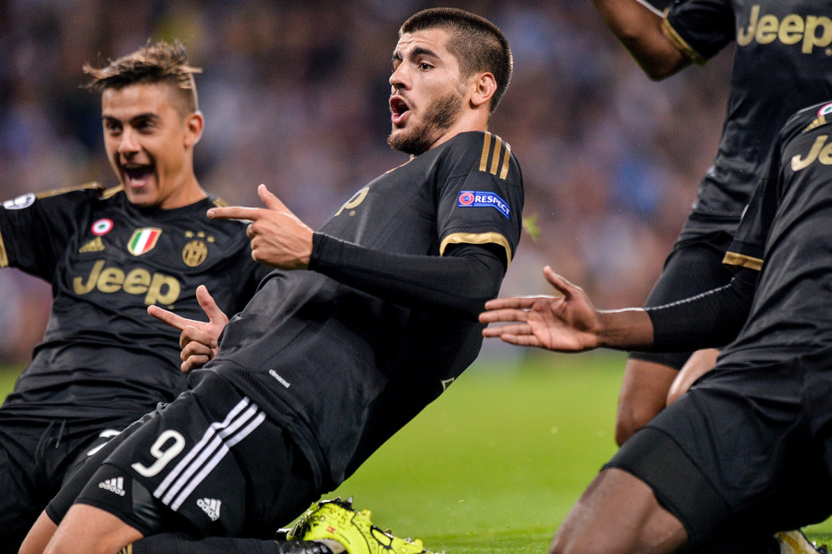 Morata e Dybala festeggiano il gol della Juventus contro il Malmoe in Champions League