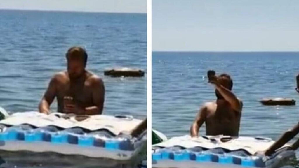 Prete in mare su un materassino che celebra messa