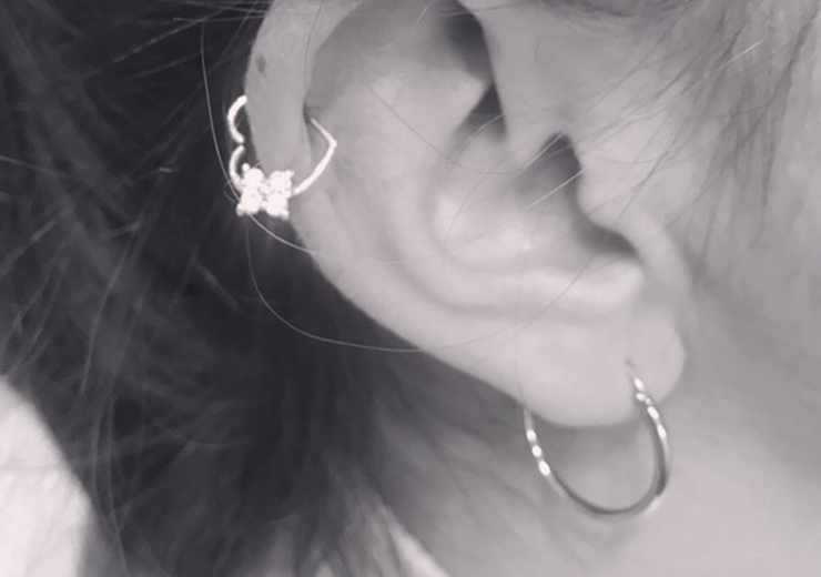 Piercing generico orecchio trago Tribal tattoo Studio roma Piercing orecchio ragazza moda