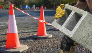 Lavori strada blocco cemento
